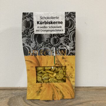 Kürbiskerne in weißer Schokolade mit Orangengeschmack 100g